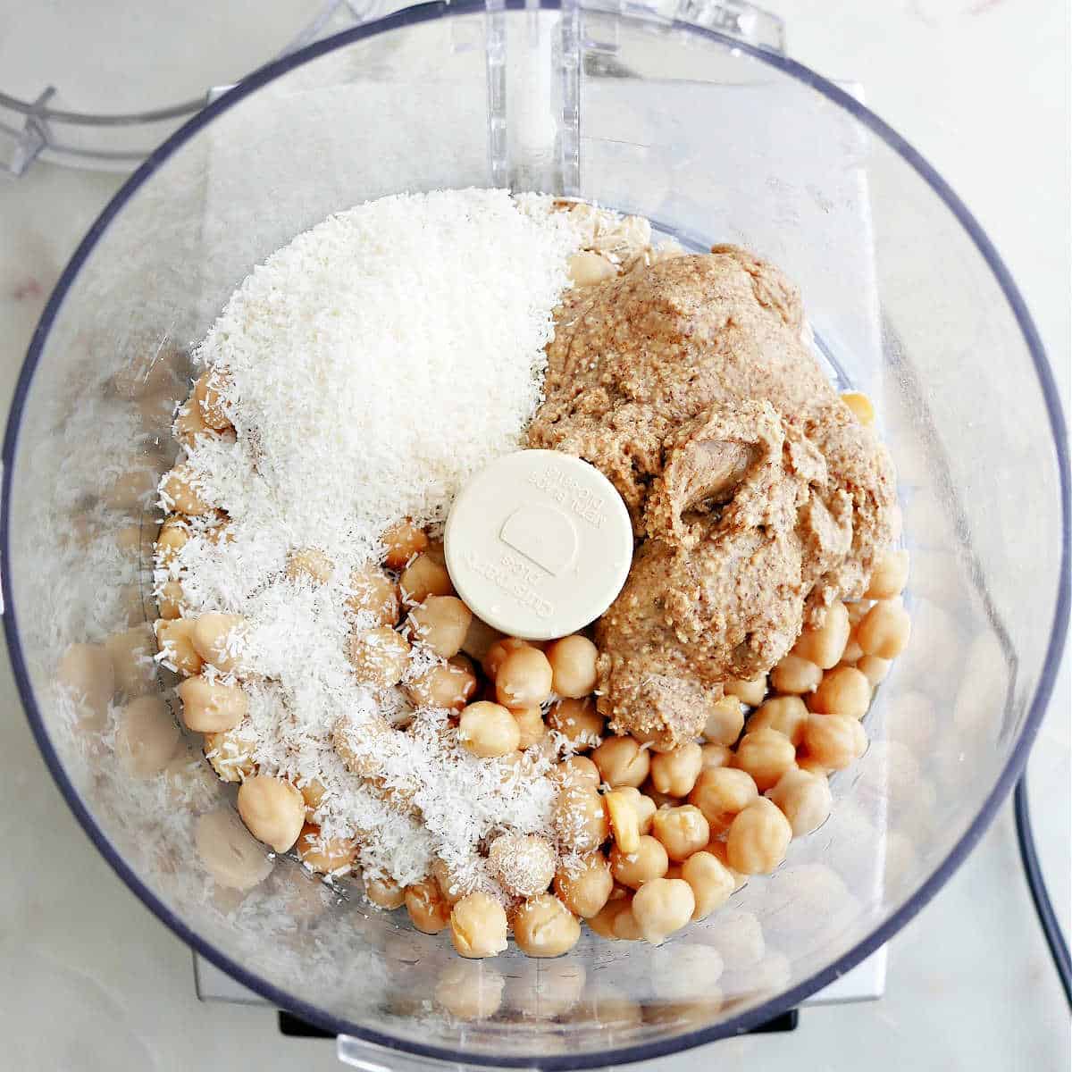 chickpeas, almond butter, coconut, oats, maple syrup, and vanilla in a food processor