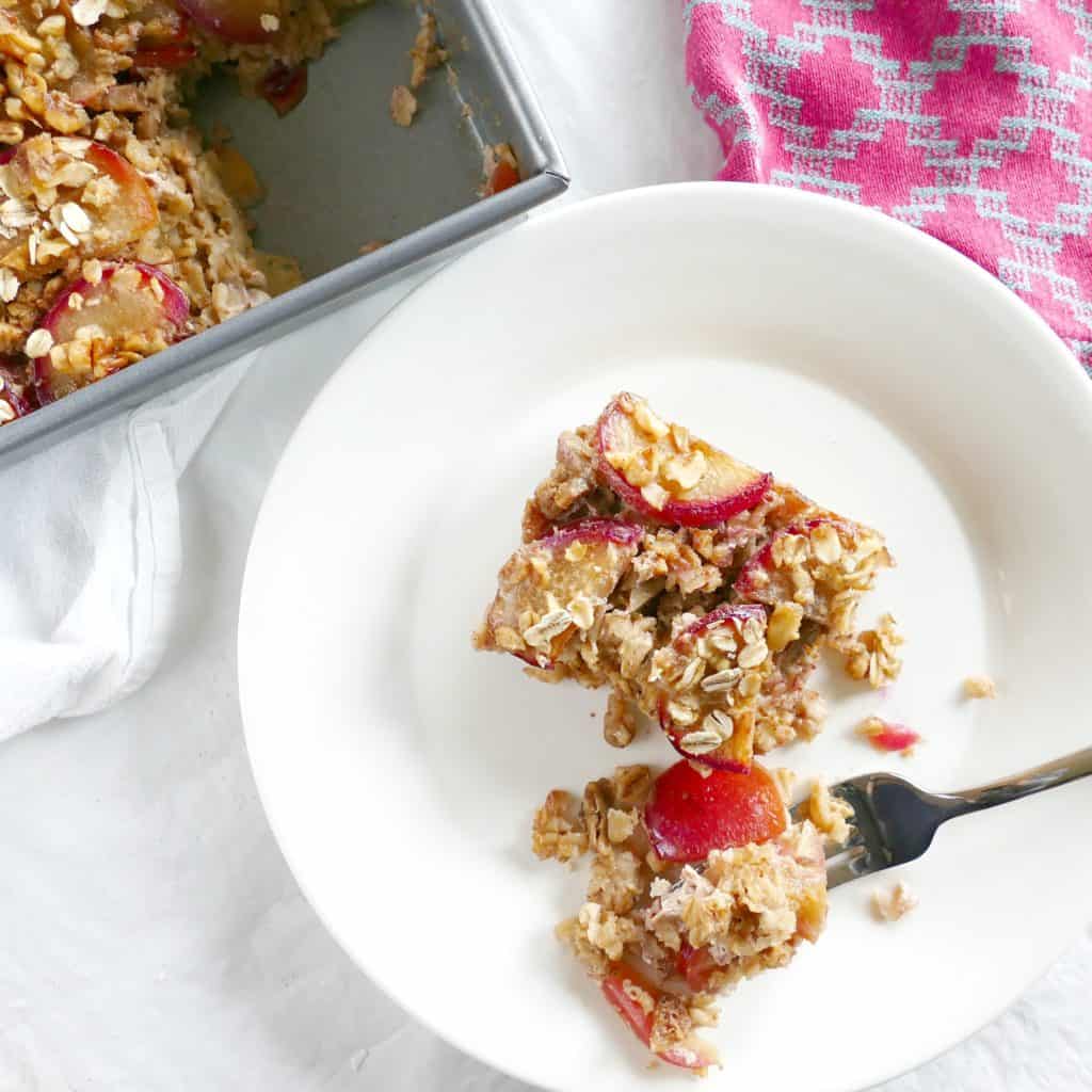 Plum walnut baked oatmeal, a vegetarian and gluten-free breakfast option perfect for holiday meals.