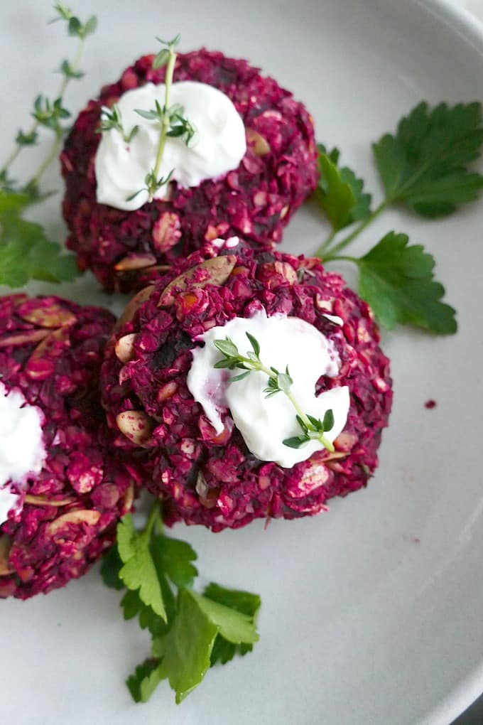 close up of beet and green lentil cakes