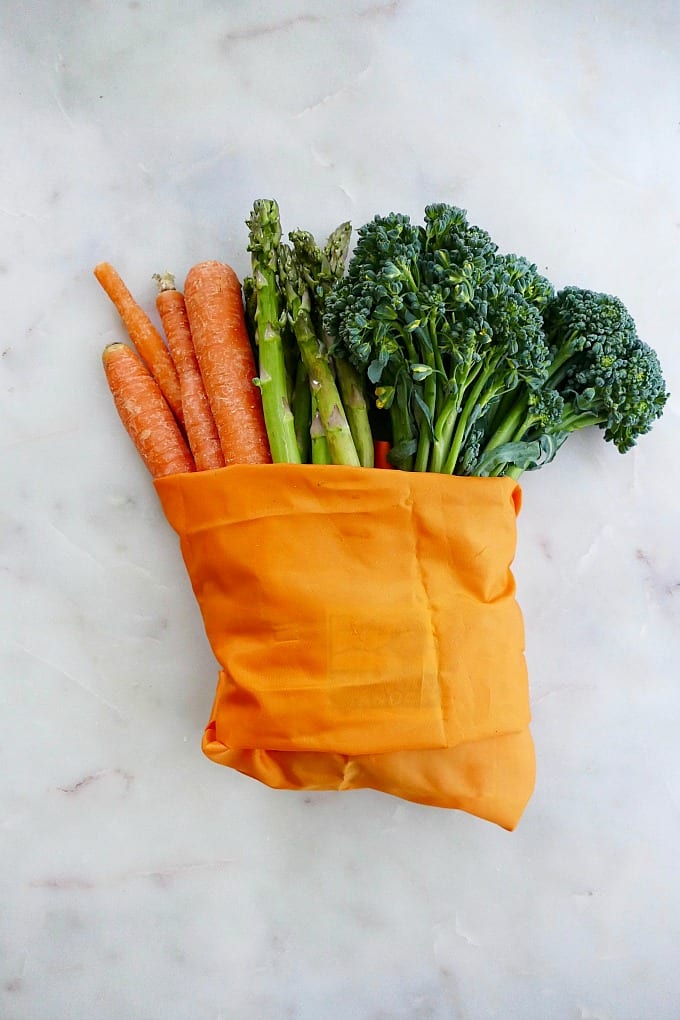 carrots, asparagus, and broccoli in produce bag