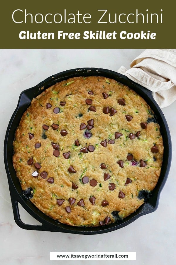 chocolate zucchini skillet cookie in a cast iron skillet with a green text box on top