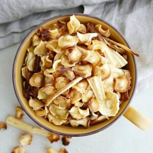 baked parsnip chips in mug