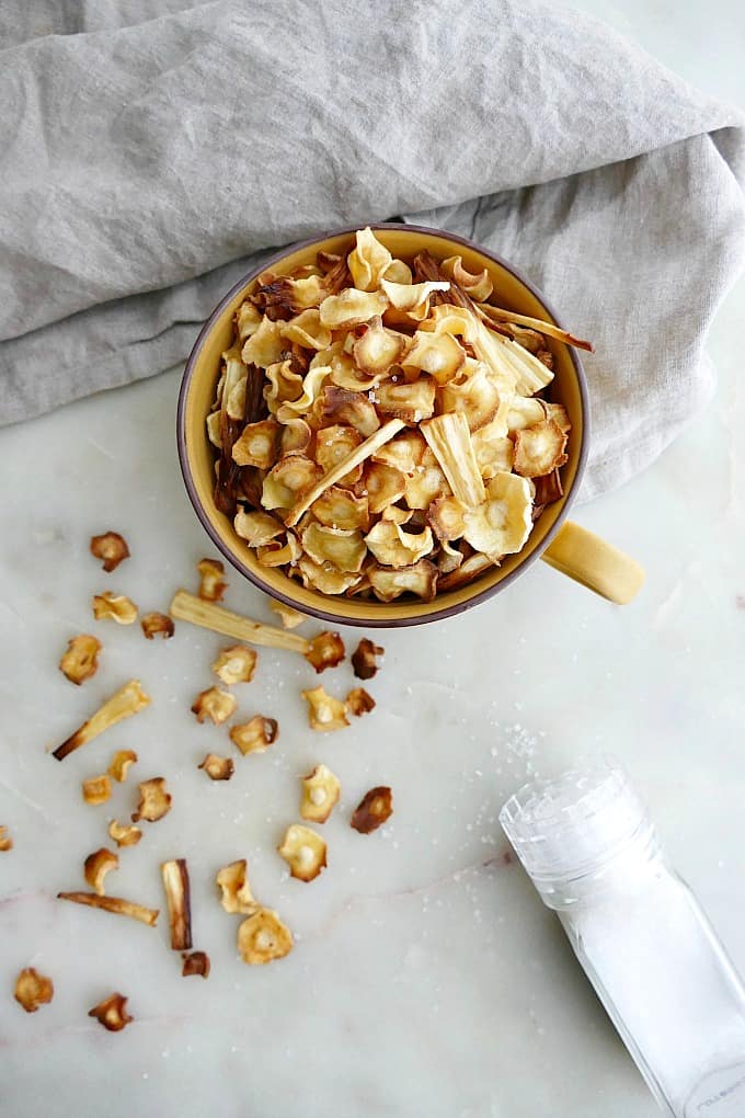 baked parsnip chips in mug