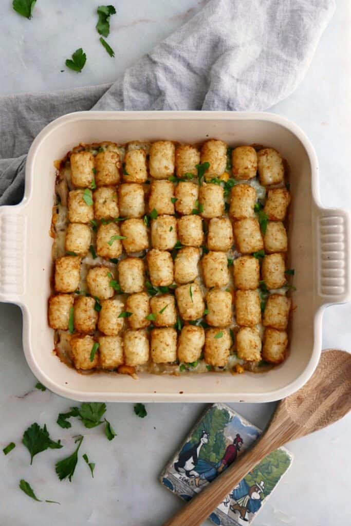 healthy tater tot casserole on a gray napkin on countertop