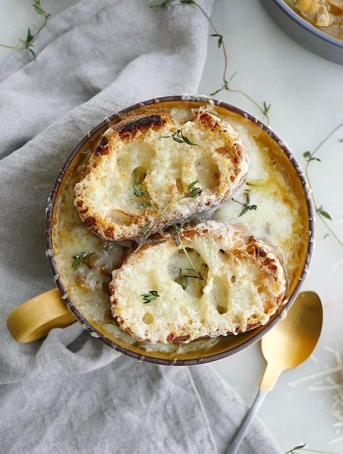 vegetarian french onion soup with lentils with gruyere toasties on top