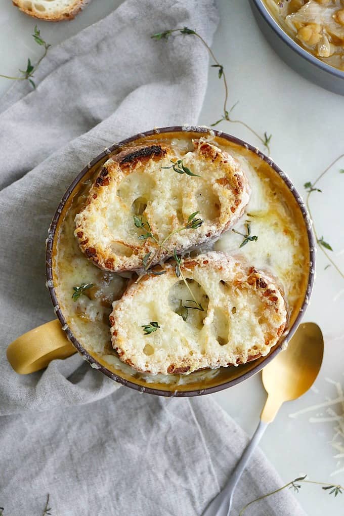 vegetarian french onion soup with lentils with gruyere toasties on top