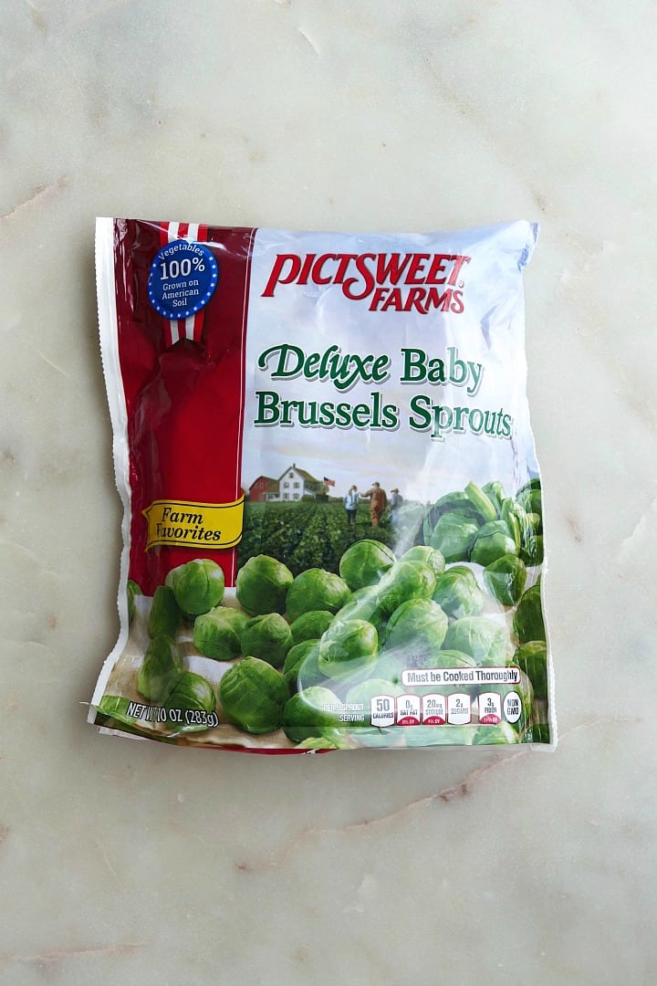 bag of frozen baby brussels sprouts on a white counter