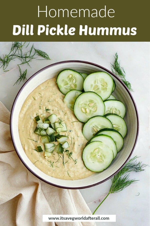 image of dill pickle hummus garnished with cucumbers with a text box on top