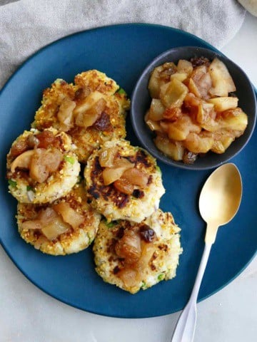 square image of five turnip hash brown cakes with apple chutney on a platter