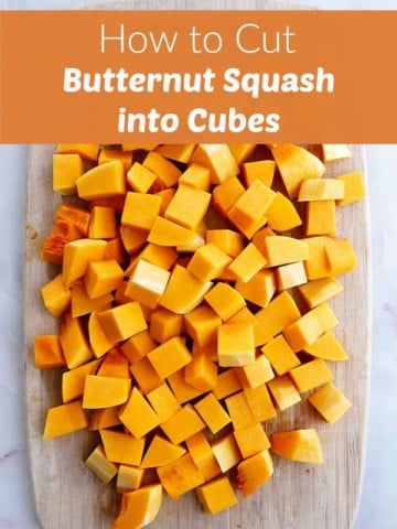 photo of cubed butternut squash on a cutting board with a text box with post title