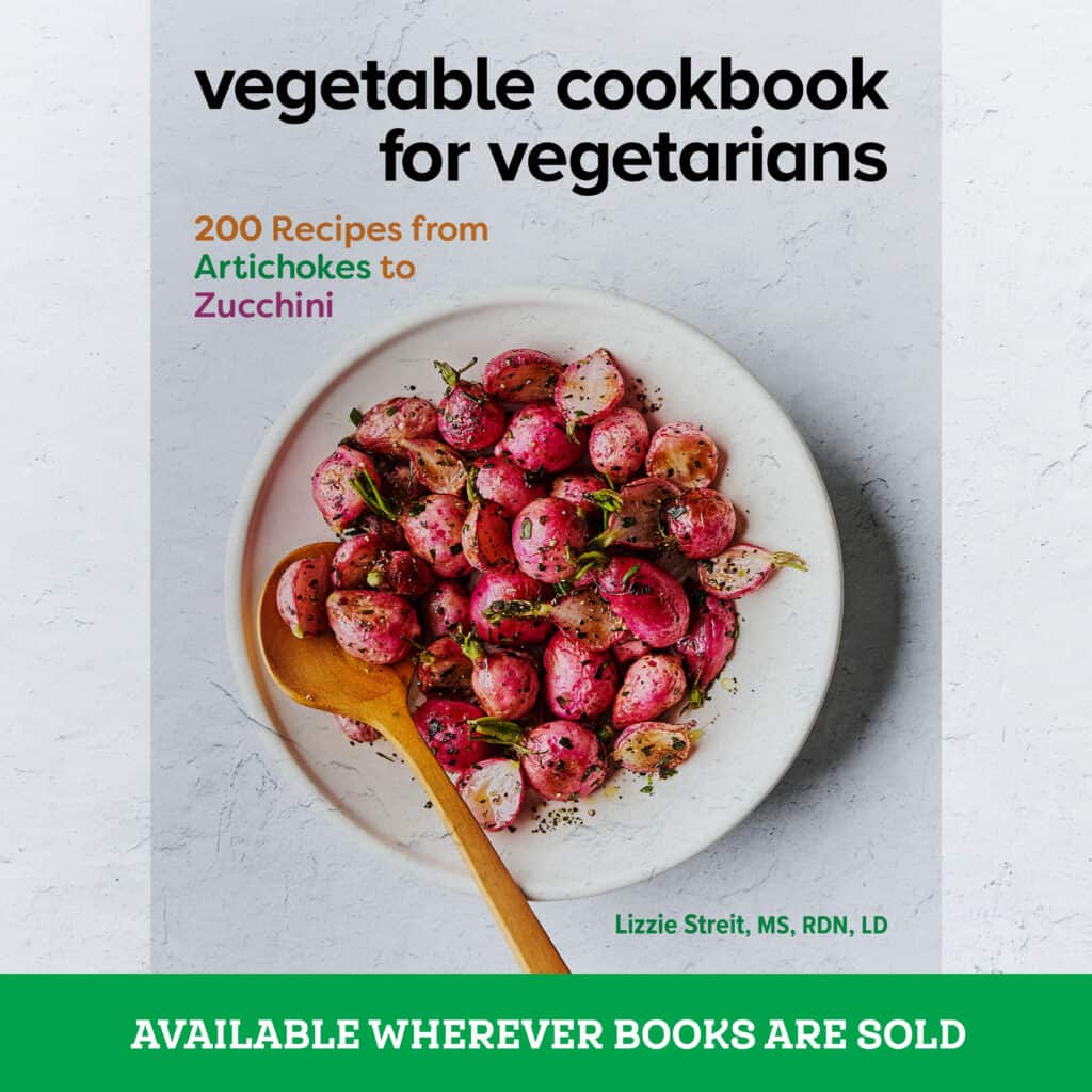 photograph of cookbook cover with a banner underneath indicating where it is sold