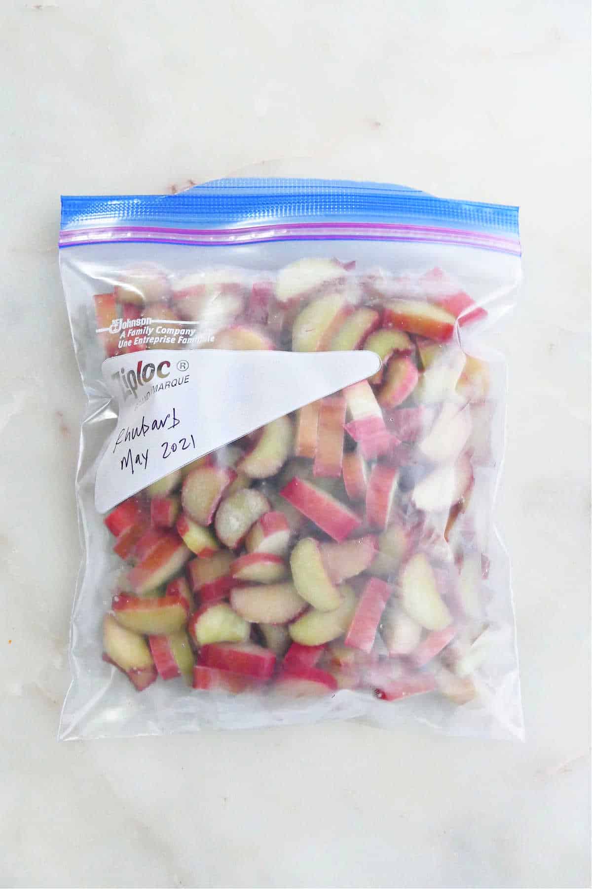 frozen rhubarb pieces in a Ziploc bag on a counter