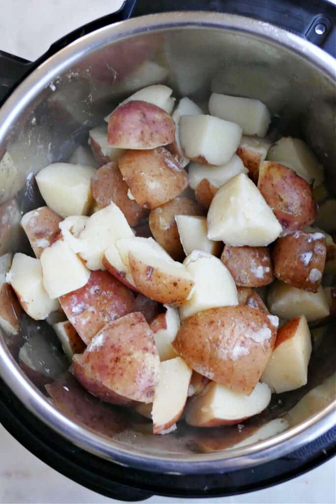 sliced red potatoes fully cooked in an Instant Pot pressure cooker