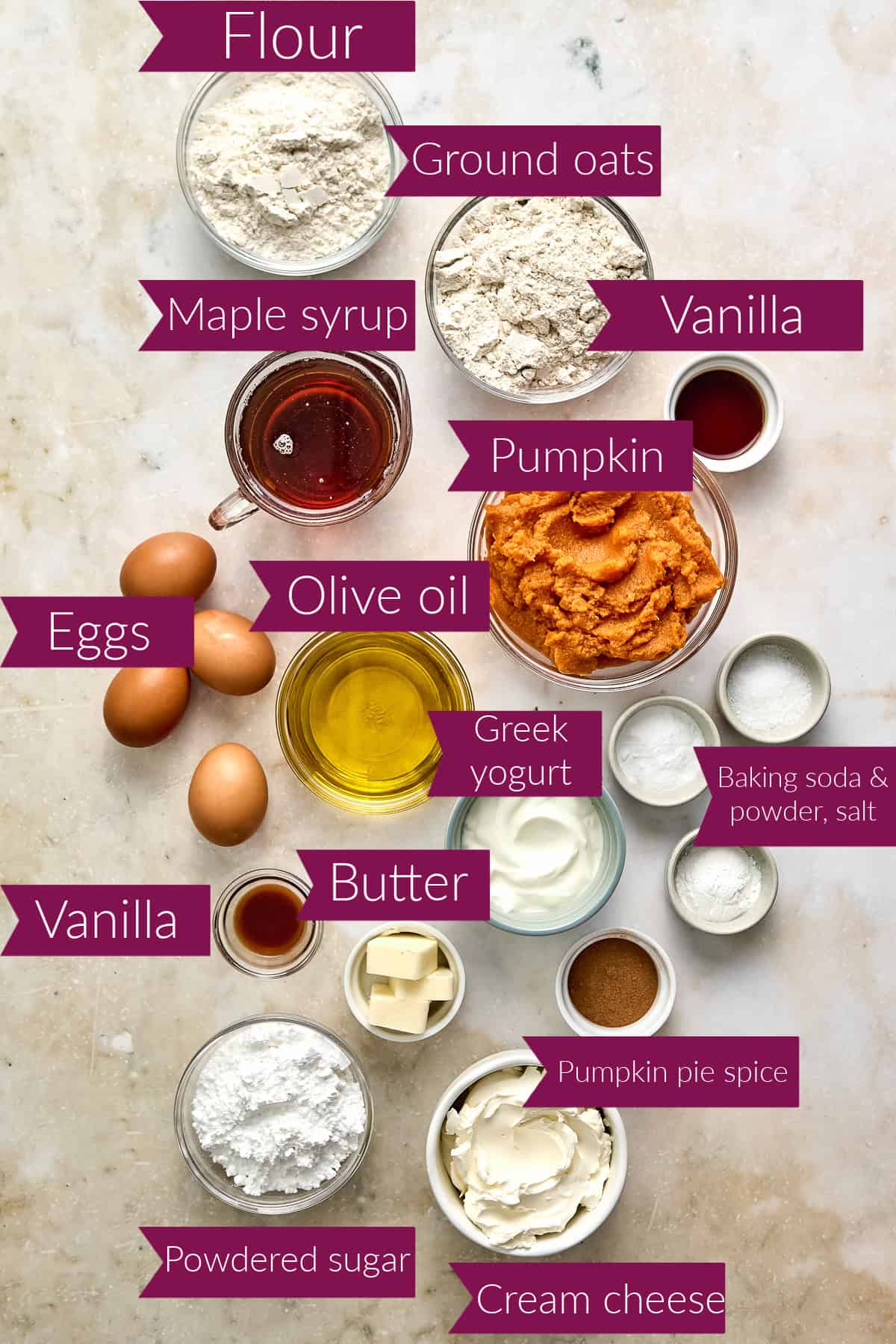 Flour, oat flour, maple syrup, vanilla, pumpkin, eggs, oil, yogurt, spices, sugar, butter, and cream cheese.