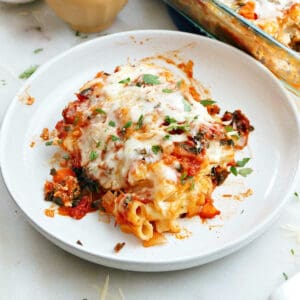 meatless baked ziti with vegetables and parsley on a plate