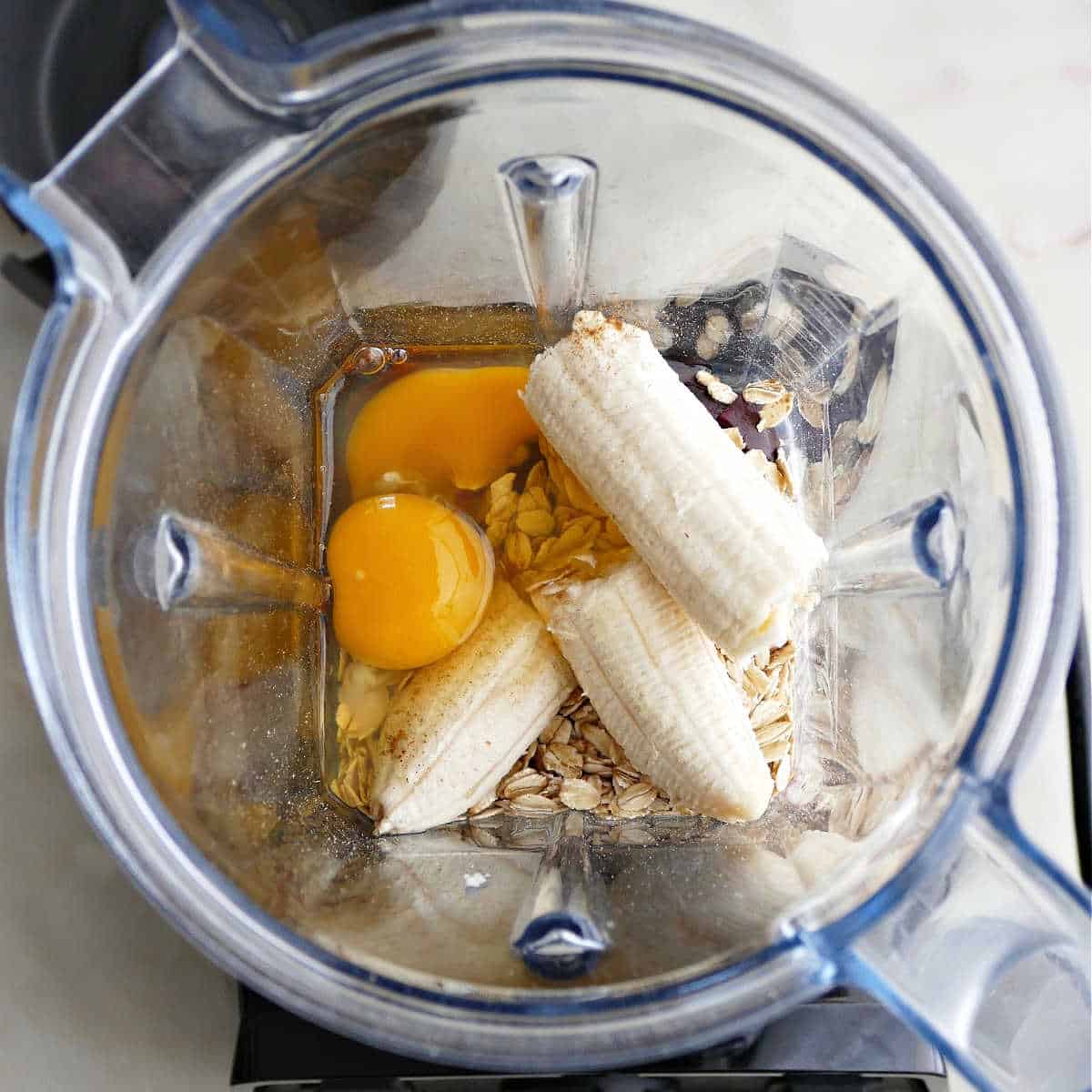 banana, eggs, roasted beets, and oats in a blender