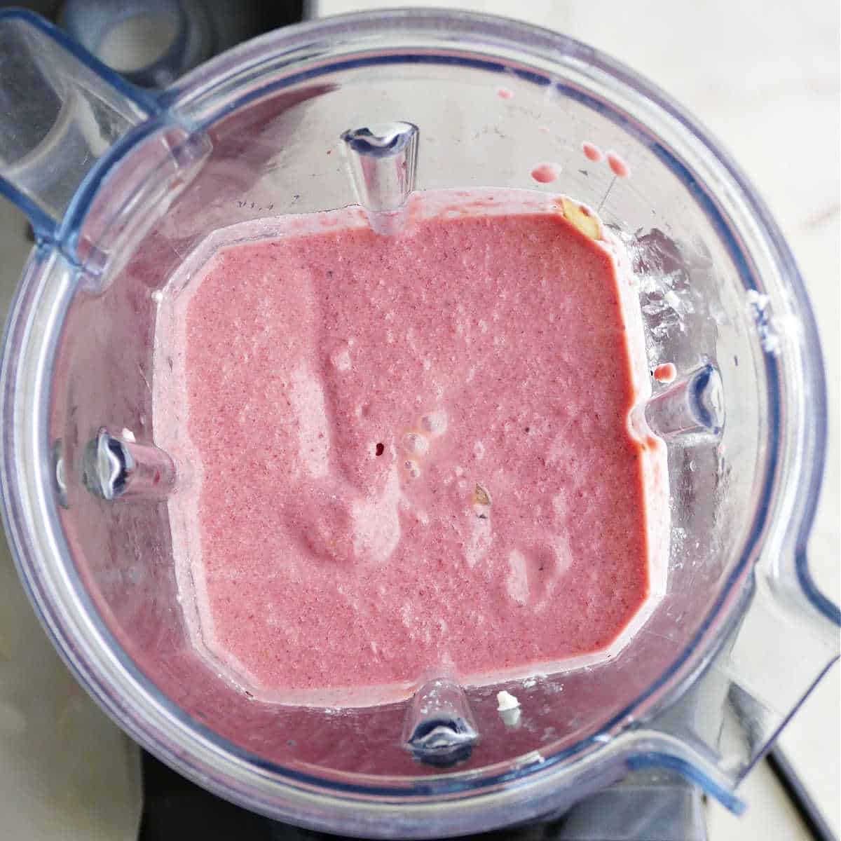 beet pasta sauce blended in a blender on a counter