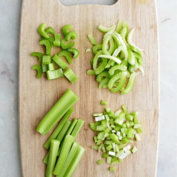 celery cut into four different ways on a cutting board