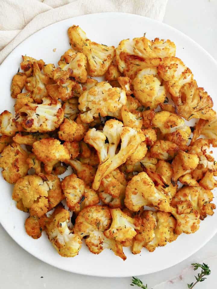 Baked Whole Cauliflower With Cheese - It's A Veg World After All®