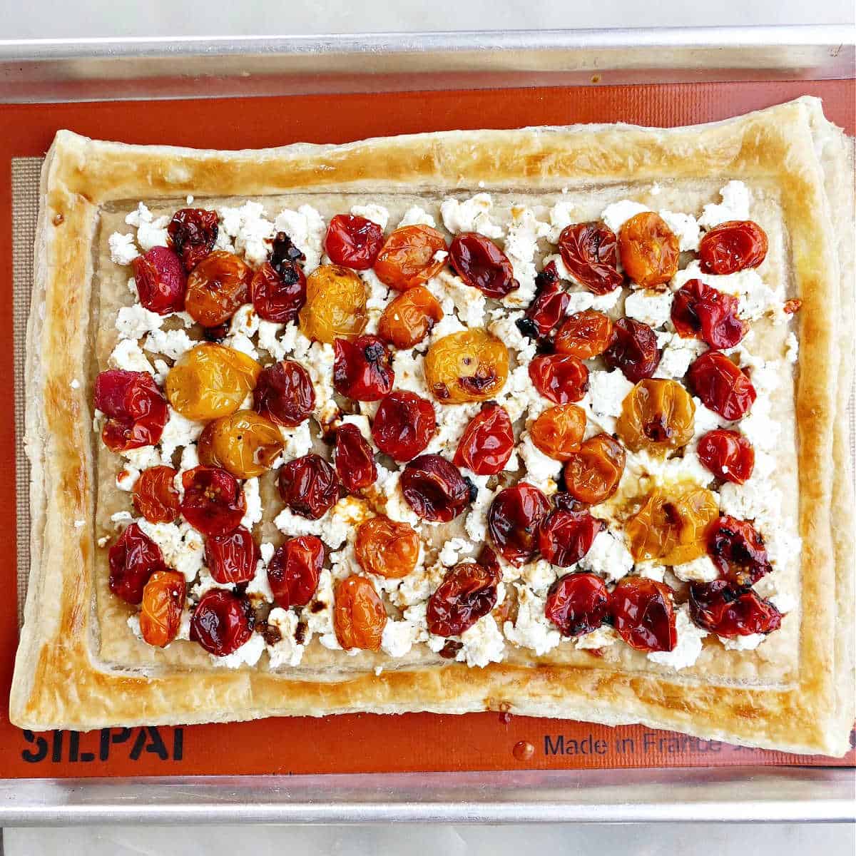 cherry tomato puff pastry before going into the oven for the second time