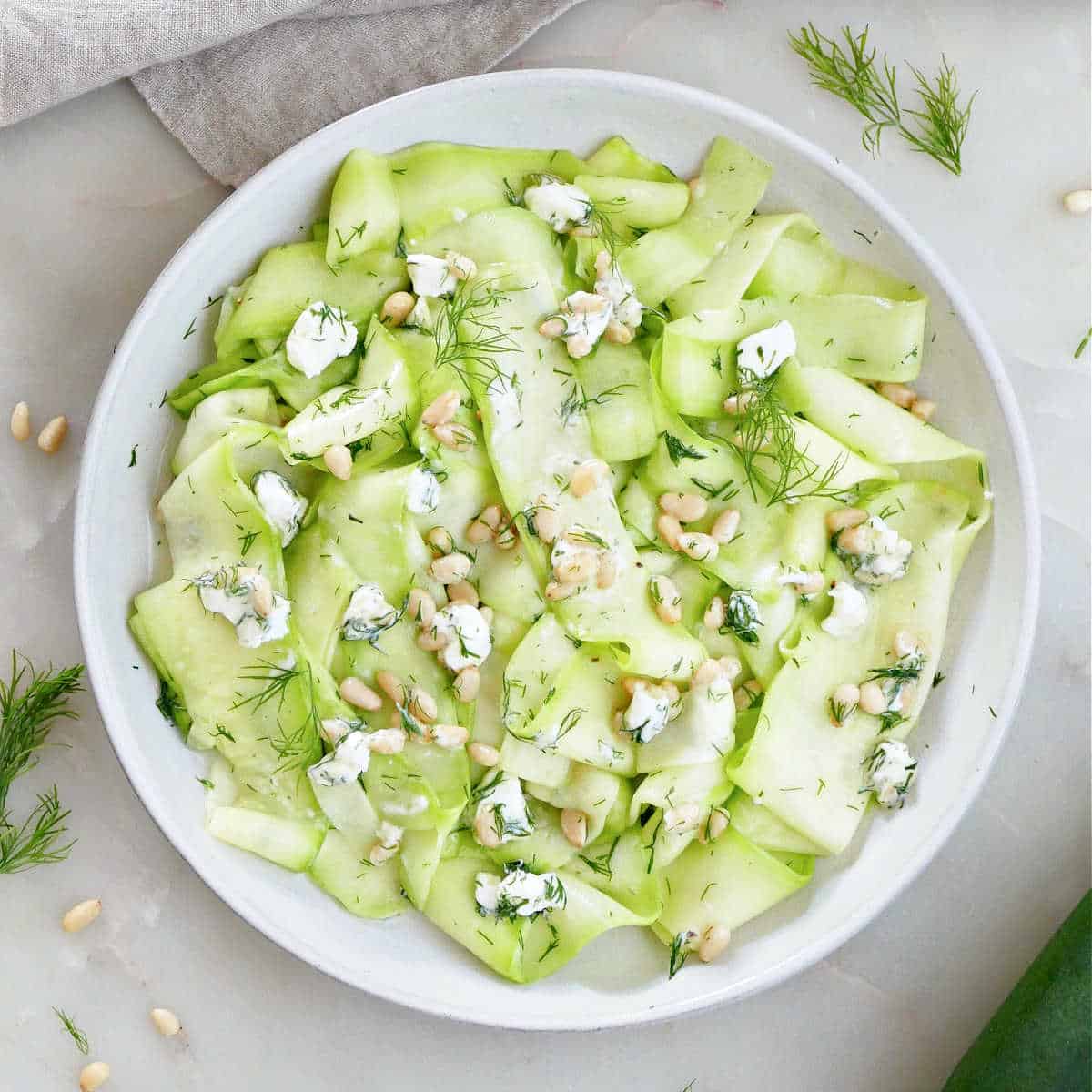 https://itsavegworldafterall.com/wp-content/uploads/2023/08/Zucchini-Ribbon-Salad-FI.jpg