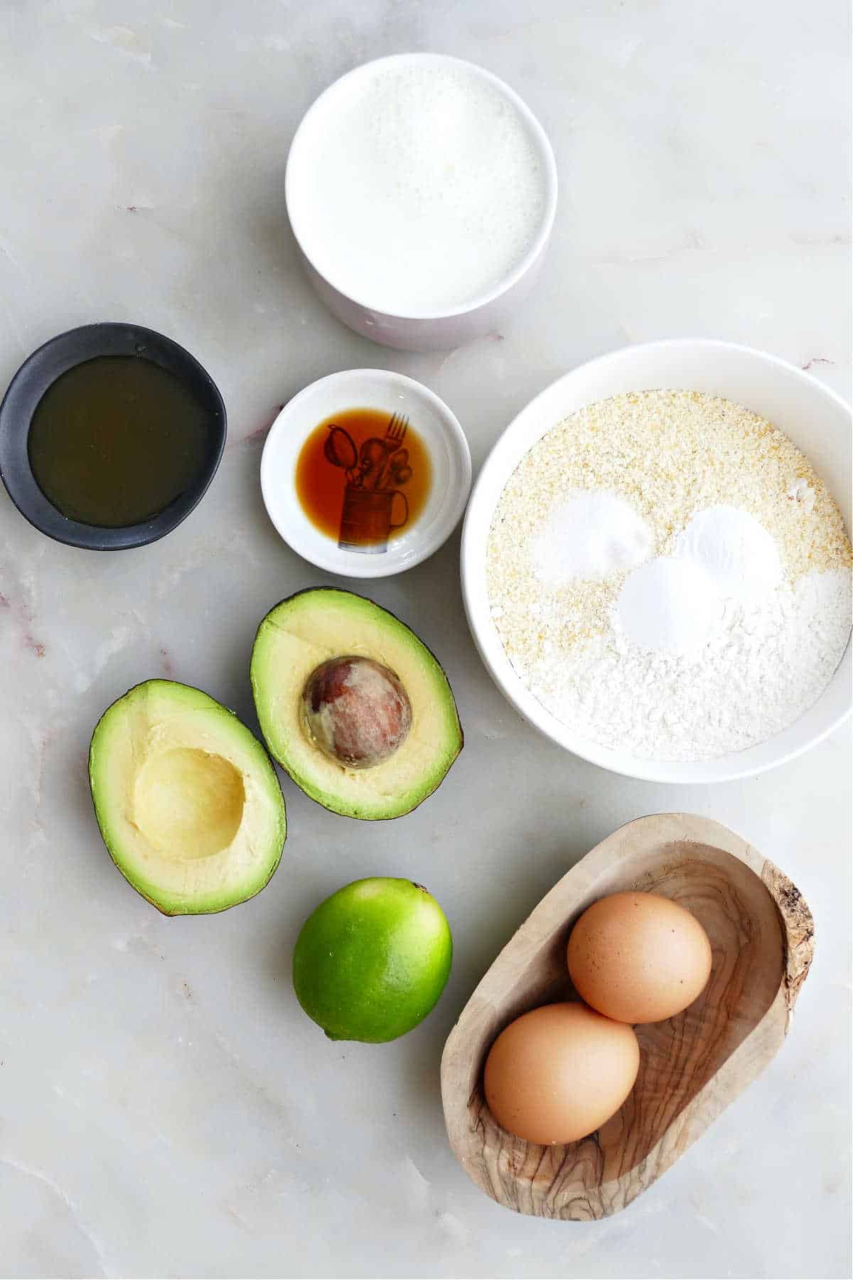 Ingredients needed to make avocado pancakes.