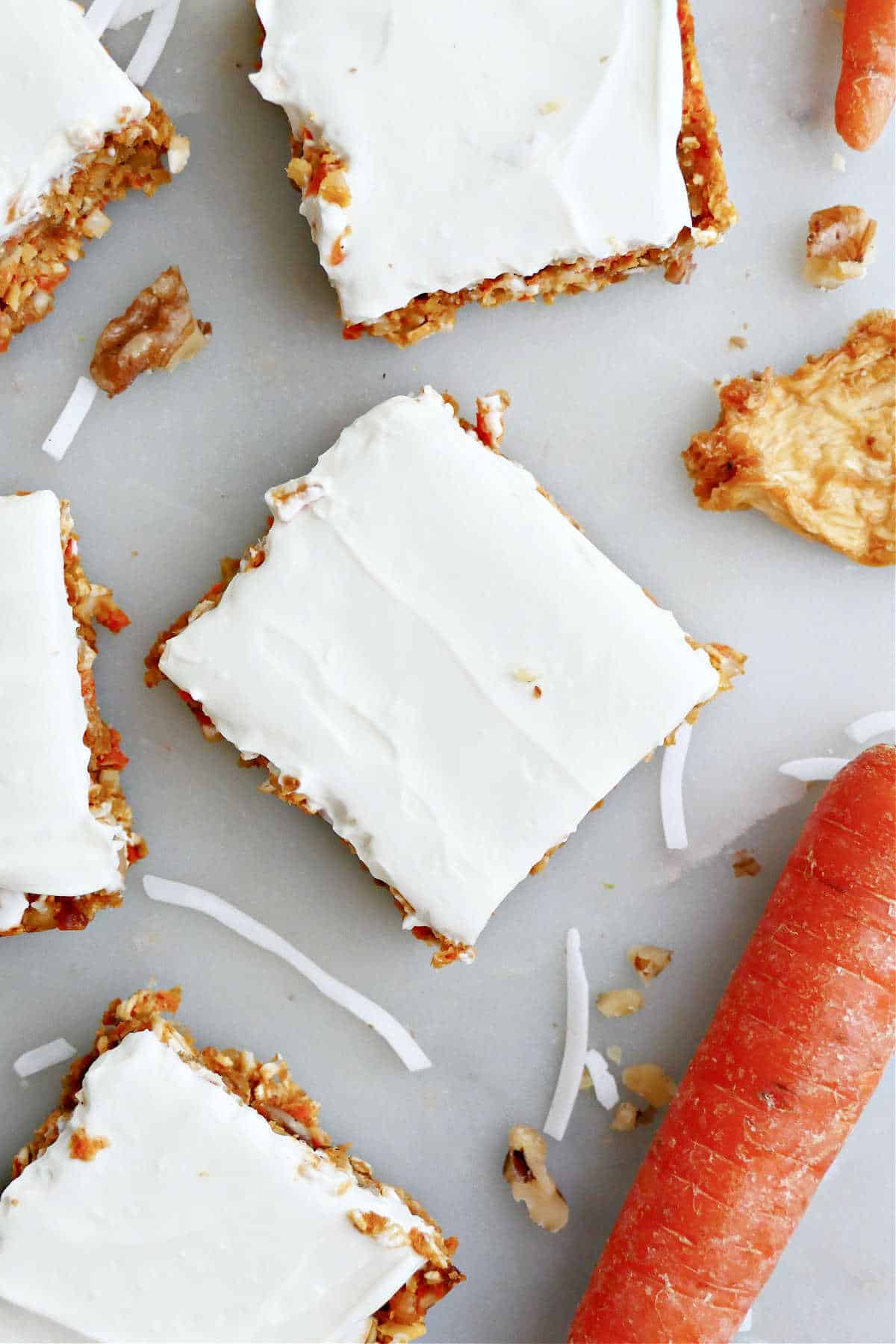 Carrot cake bars sliced and frosted.