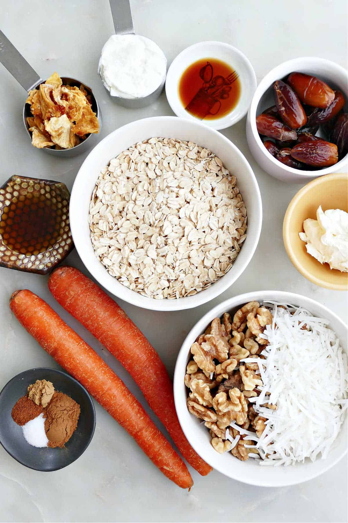 Ingredients needed to make healthy carrot cake bars.