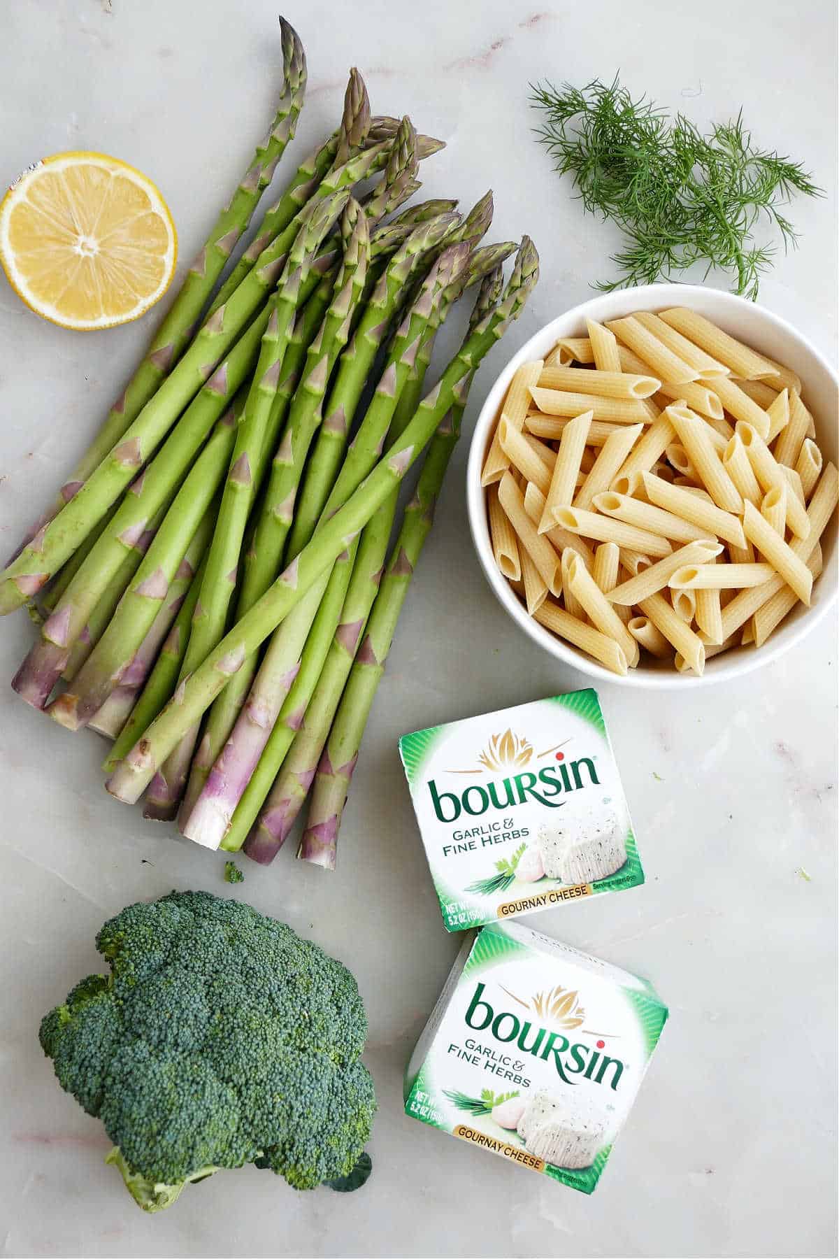Ingredients needed to make asparagus broccoli pasta.