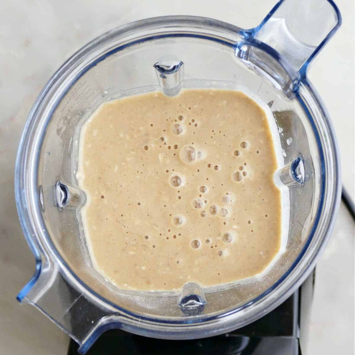 Blended banana pancakes in a blender.