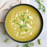 Cold asparagus soup without cream in a large bowl.