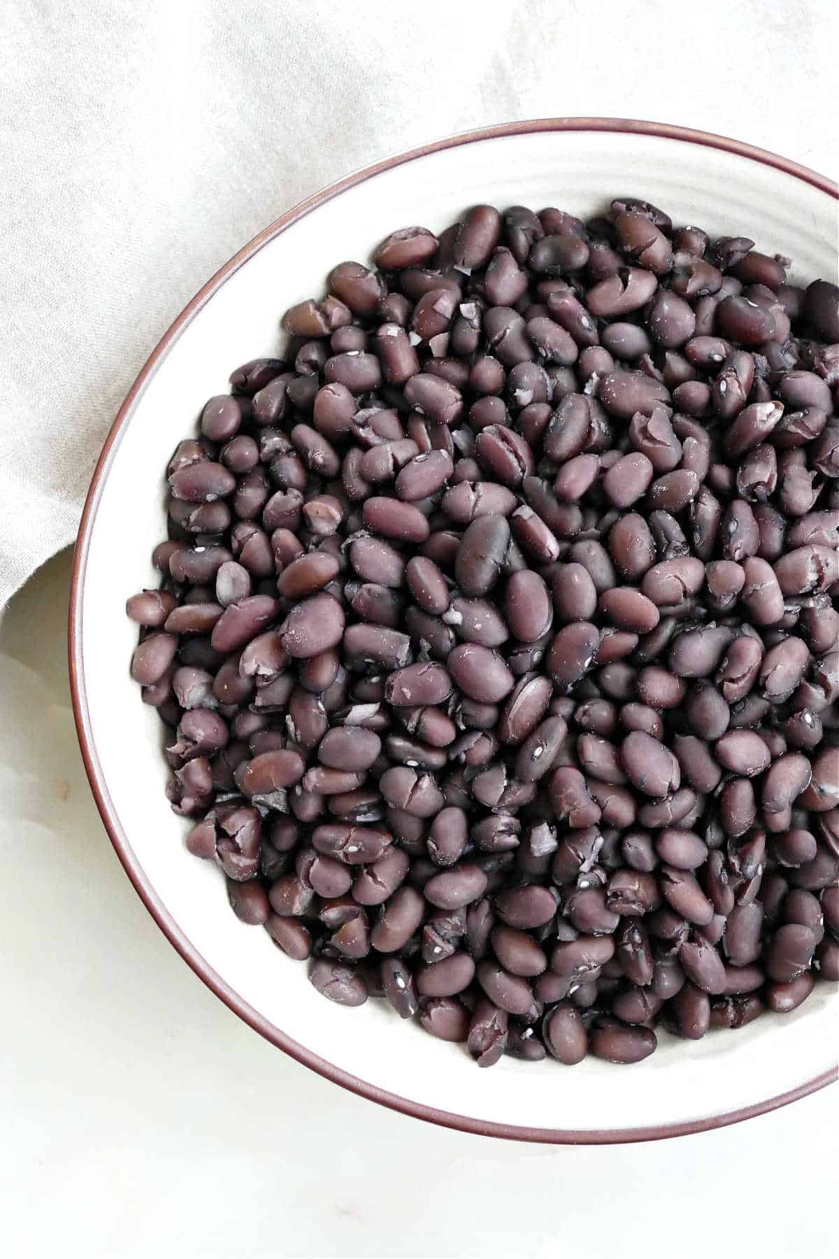 Cook dried black beans in a serving bowl.