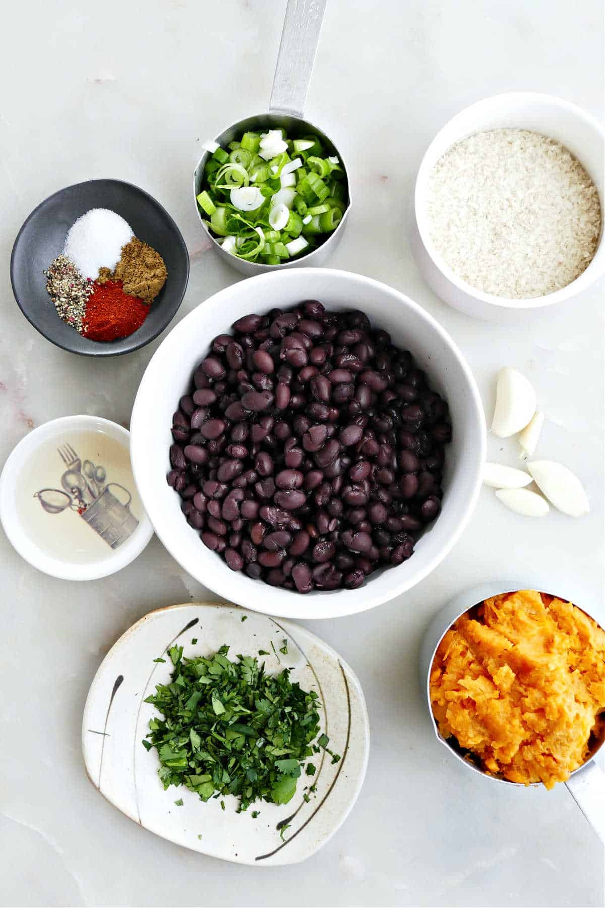 Ingredients needed to make sweet potato black bean burgers.
