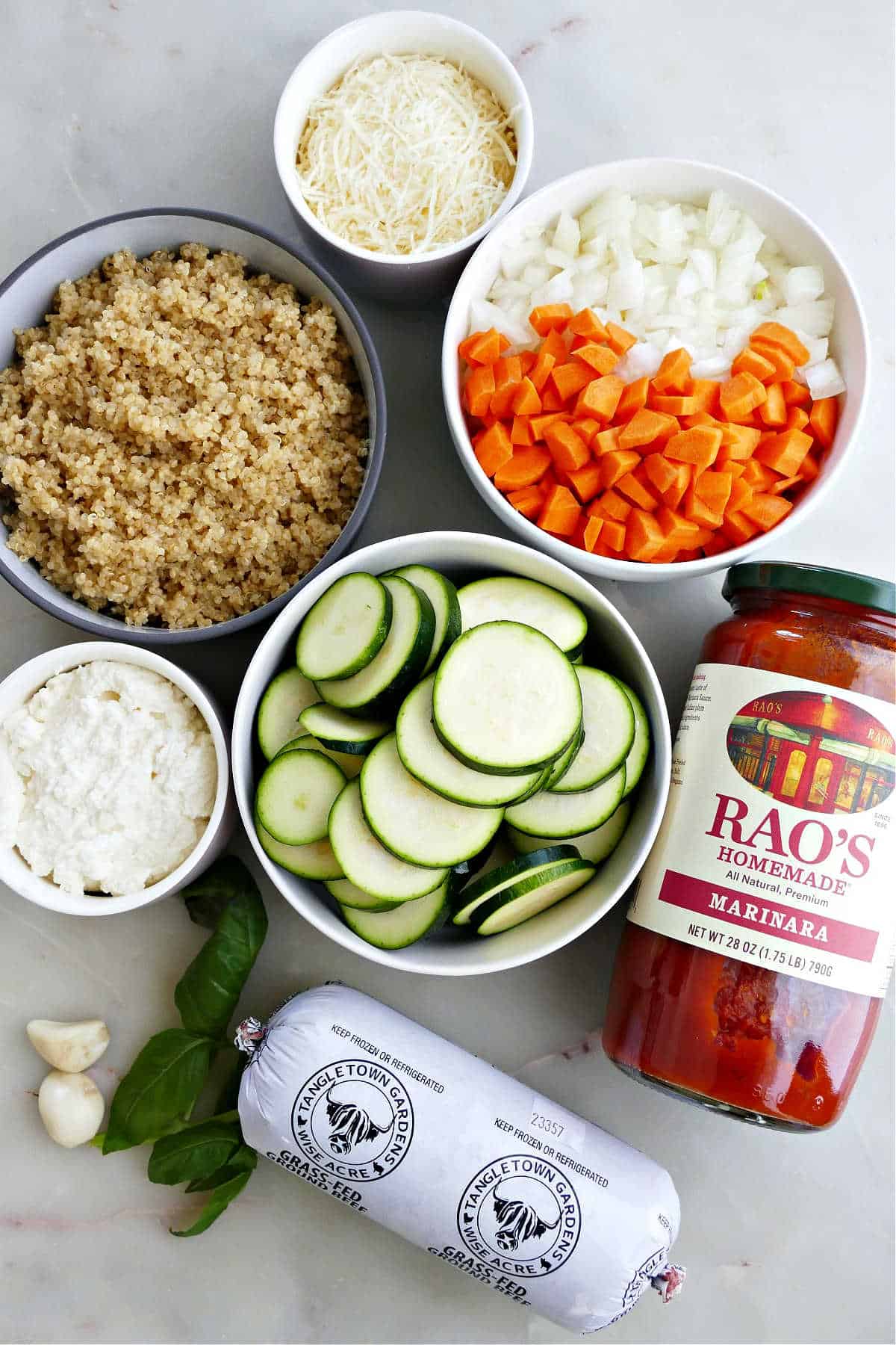 Ingredients needed to make healthy zucchini ground beef casserole.