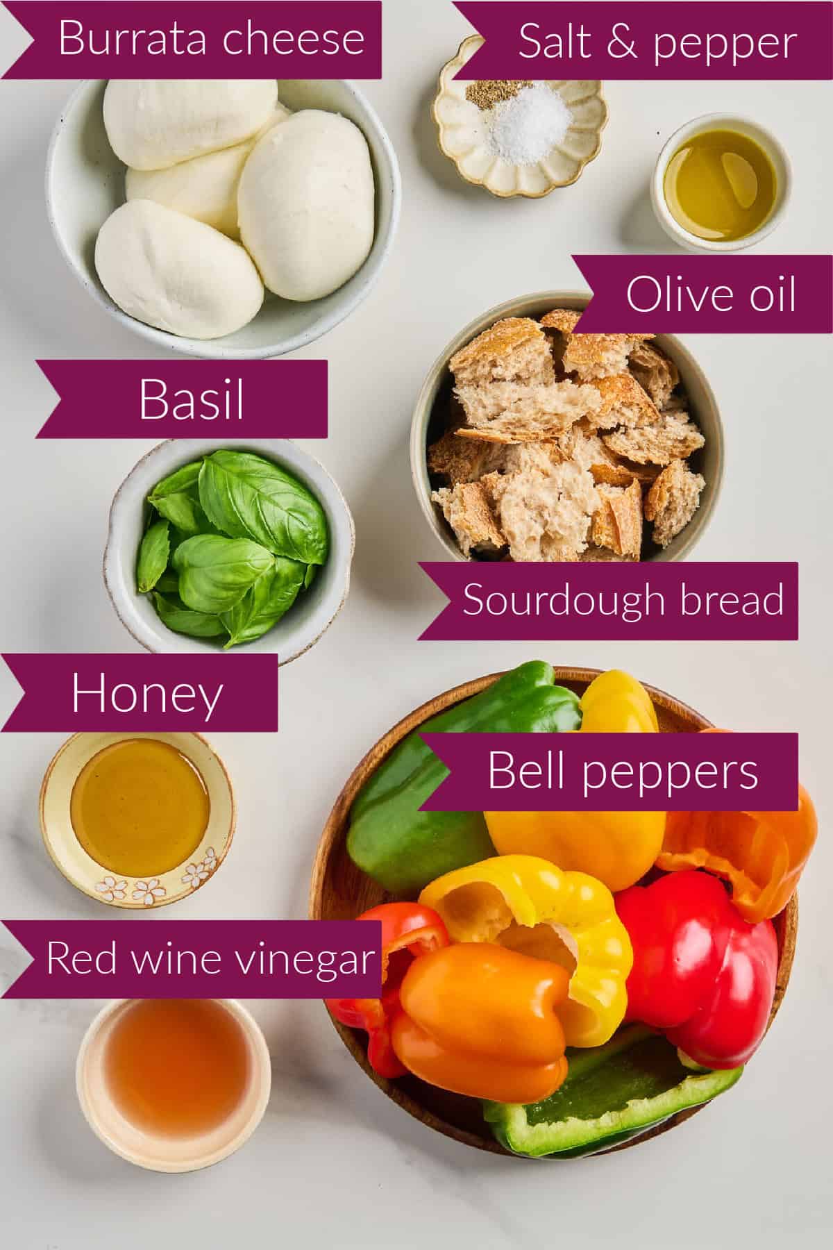 Burrata, salt and pepper, olive oil, basil, sourdough, honey, vinegar, and bell peppers with labels.