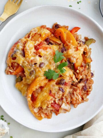 A scoop of unstuffed bell pepper casserole on a white plate.