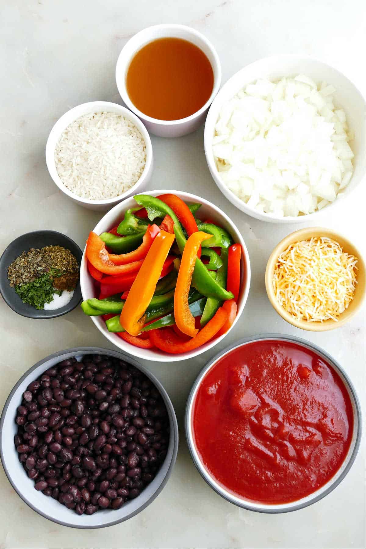 Ingredients needed to make crockpot stuffed pepper casserole.