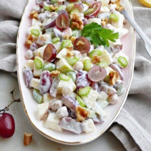 Creamy healthy waldorf salad in a serving bowl.