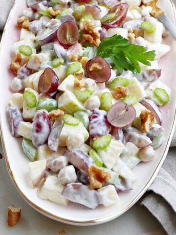 Creamy healthy waldorf salad in a serving bowl.