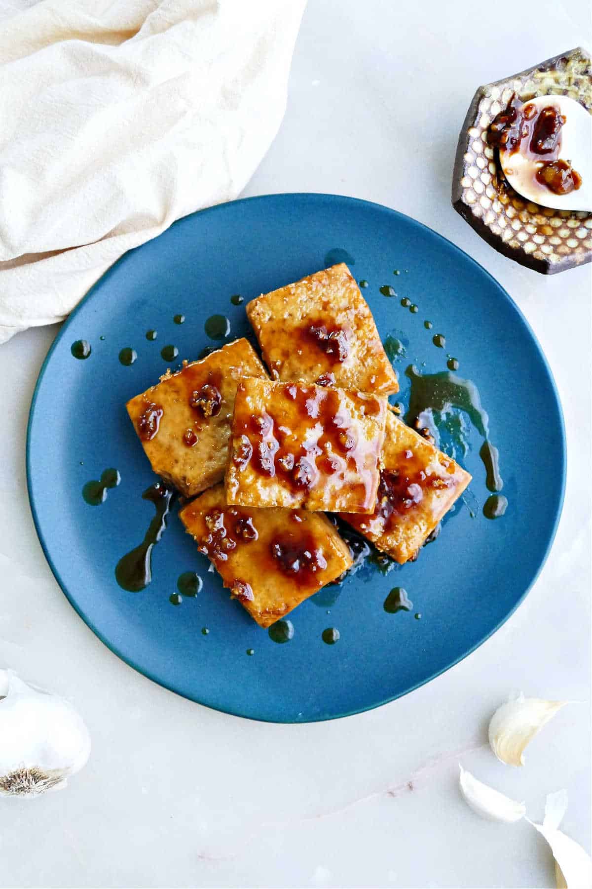 Maple glazed tofu on a large plate.