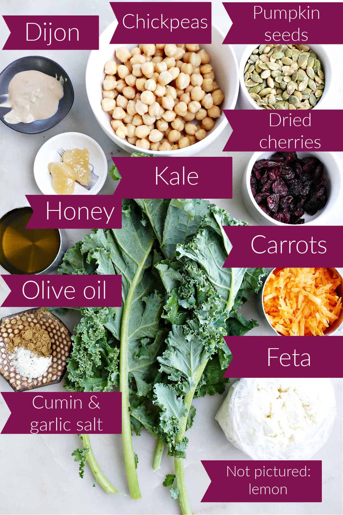 Ingredients for massaged kale salad on a counter with labels.