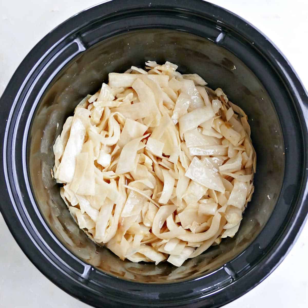 Cooked cabbage in the slow cooker.