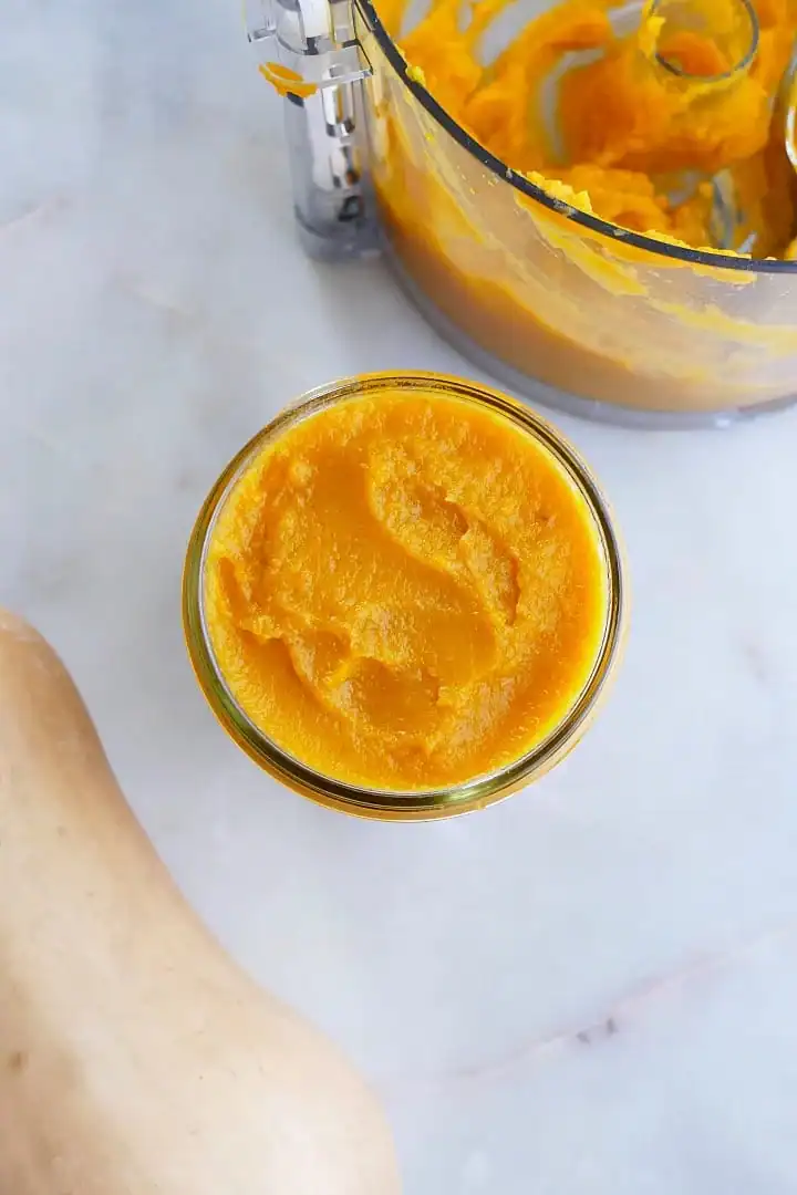 A jar of homemade butternut squash puree. 