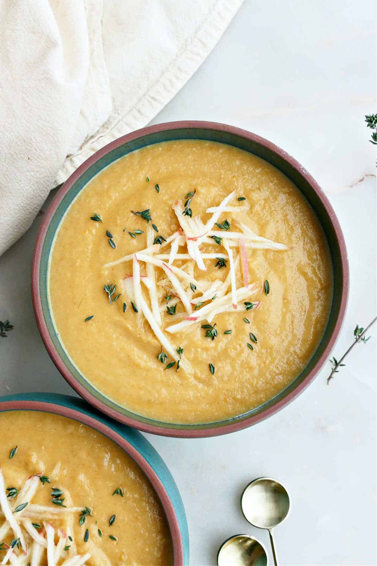 Two bowls of Carrot and Turnip Soup. 