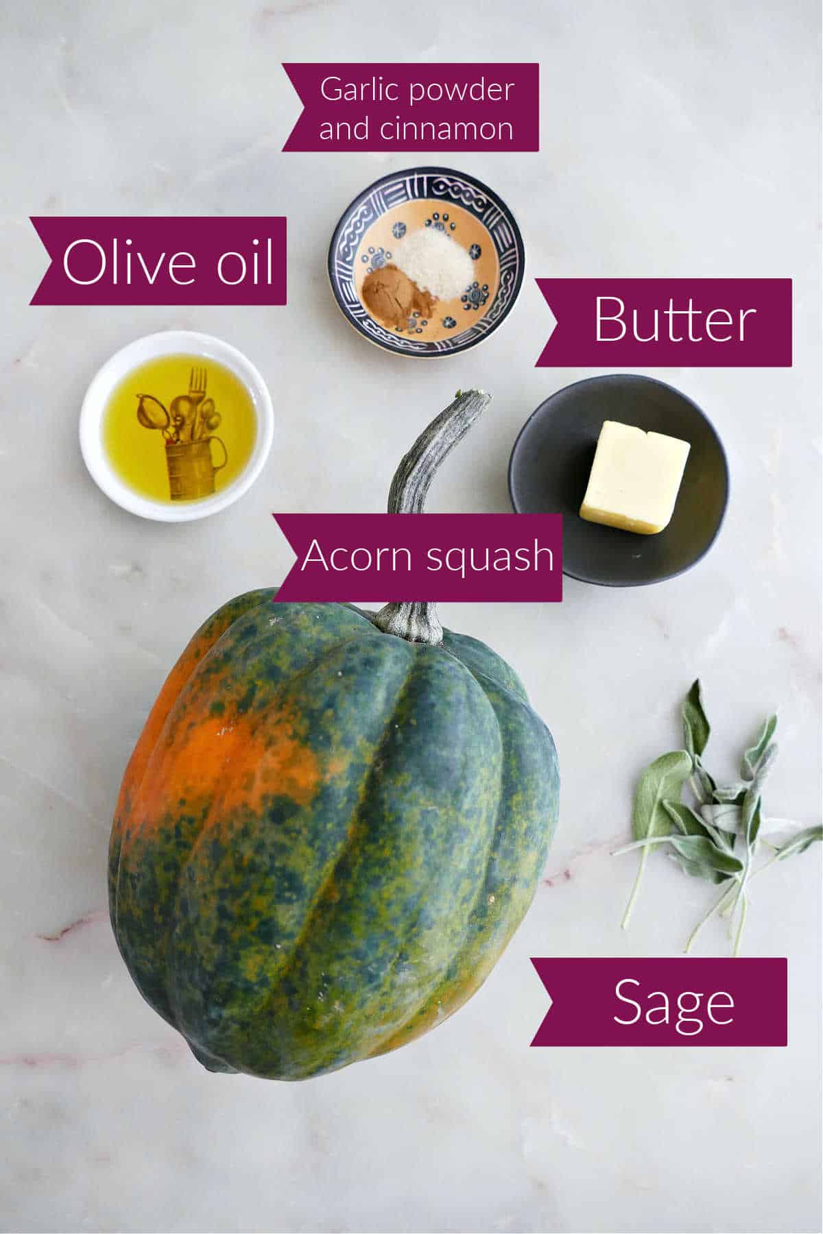 Olive oil, seasonings, butter, acorn squash, and sage with labels on a counter.