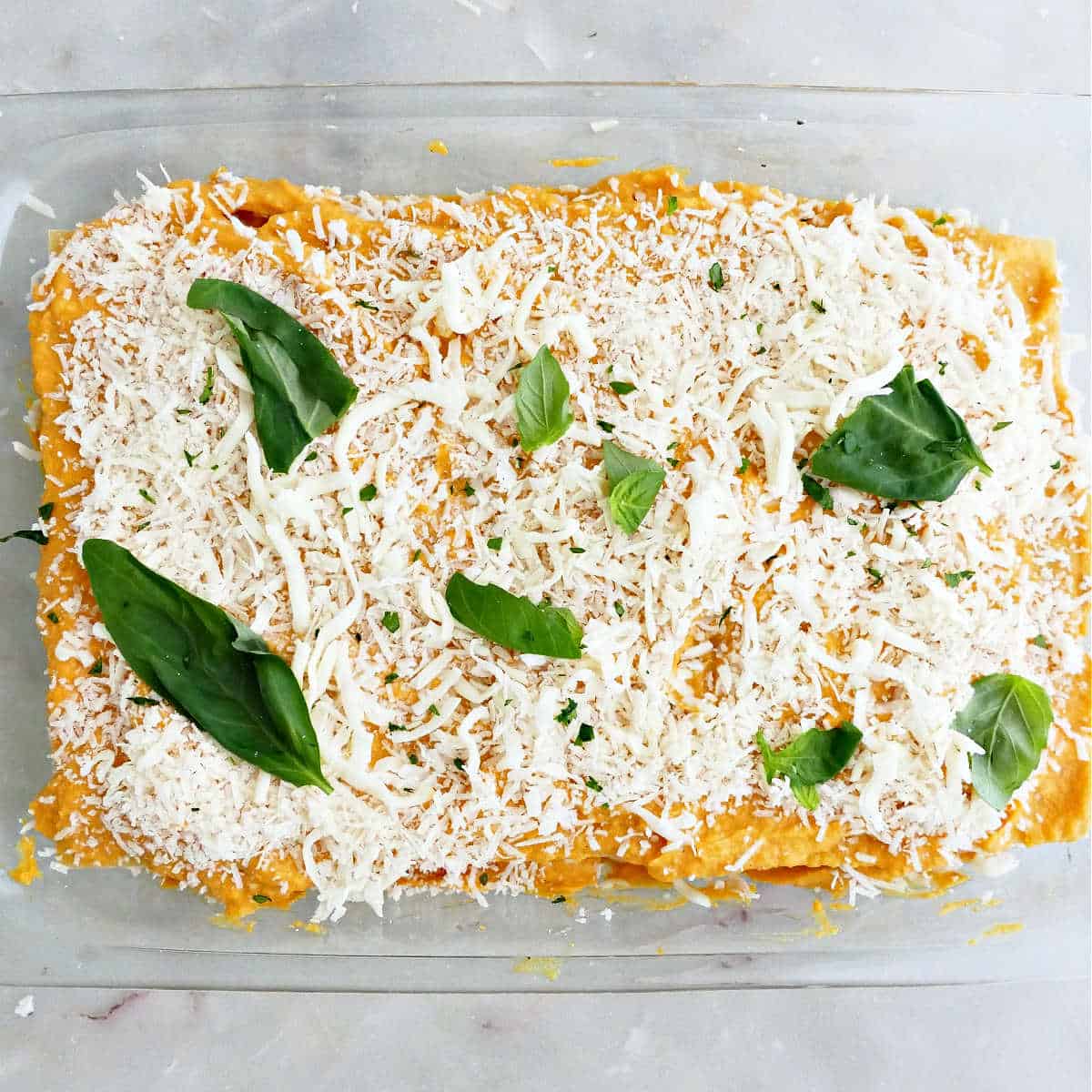 Butternut squash lasagna assembled before going into the oven.