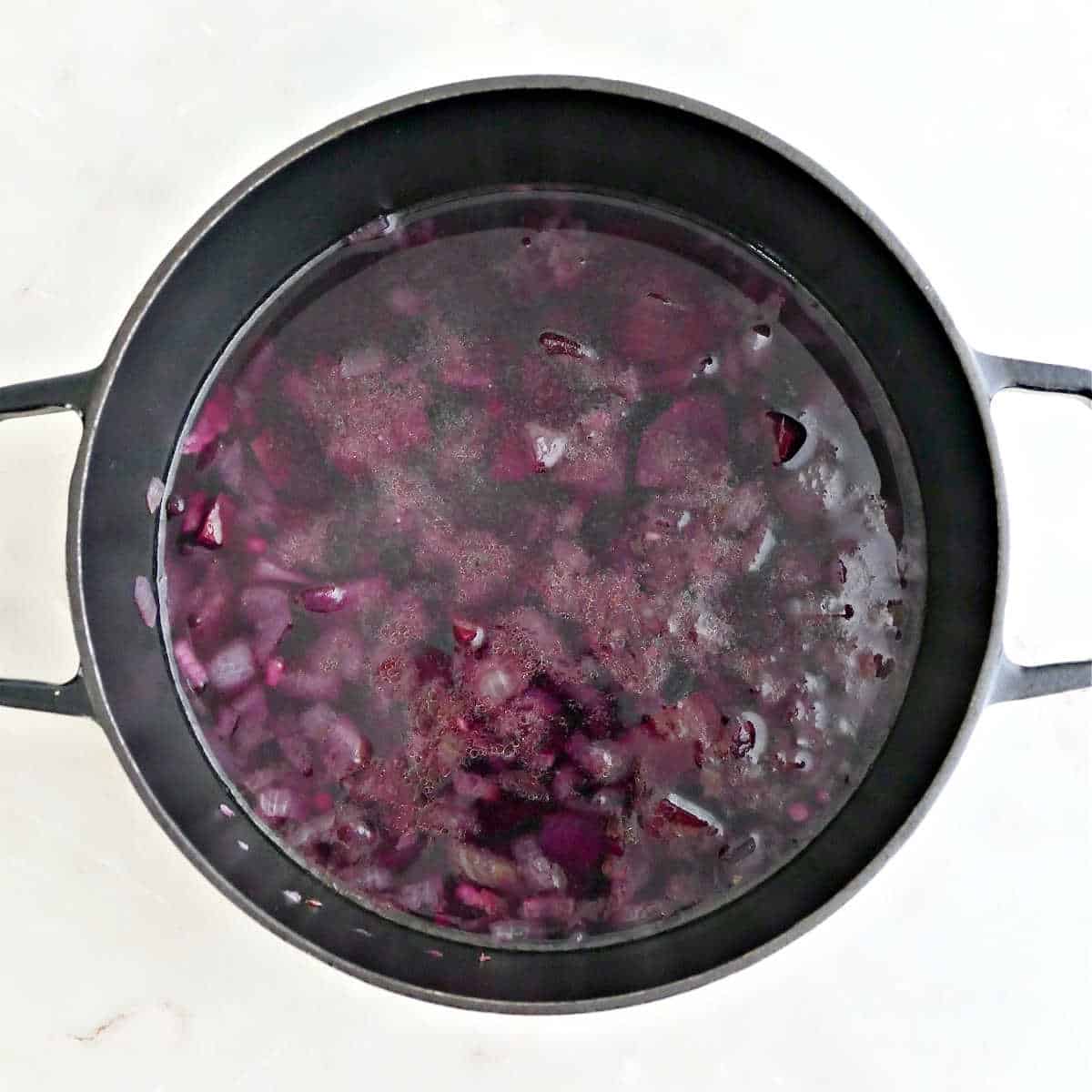 Ingredients for purple sweet potato soup after simmering on the stove.