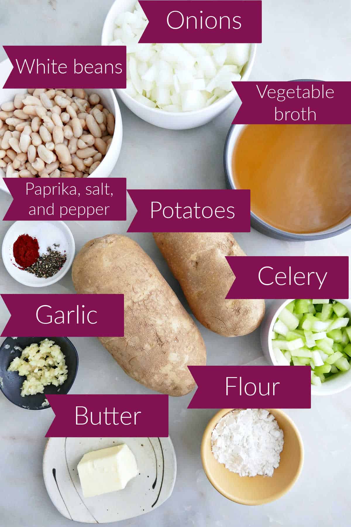 White beans, onions, broth, spices, potatoes, celery, garlic, butter, and flour in bowls with labels.