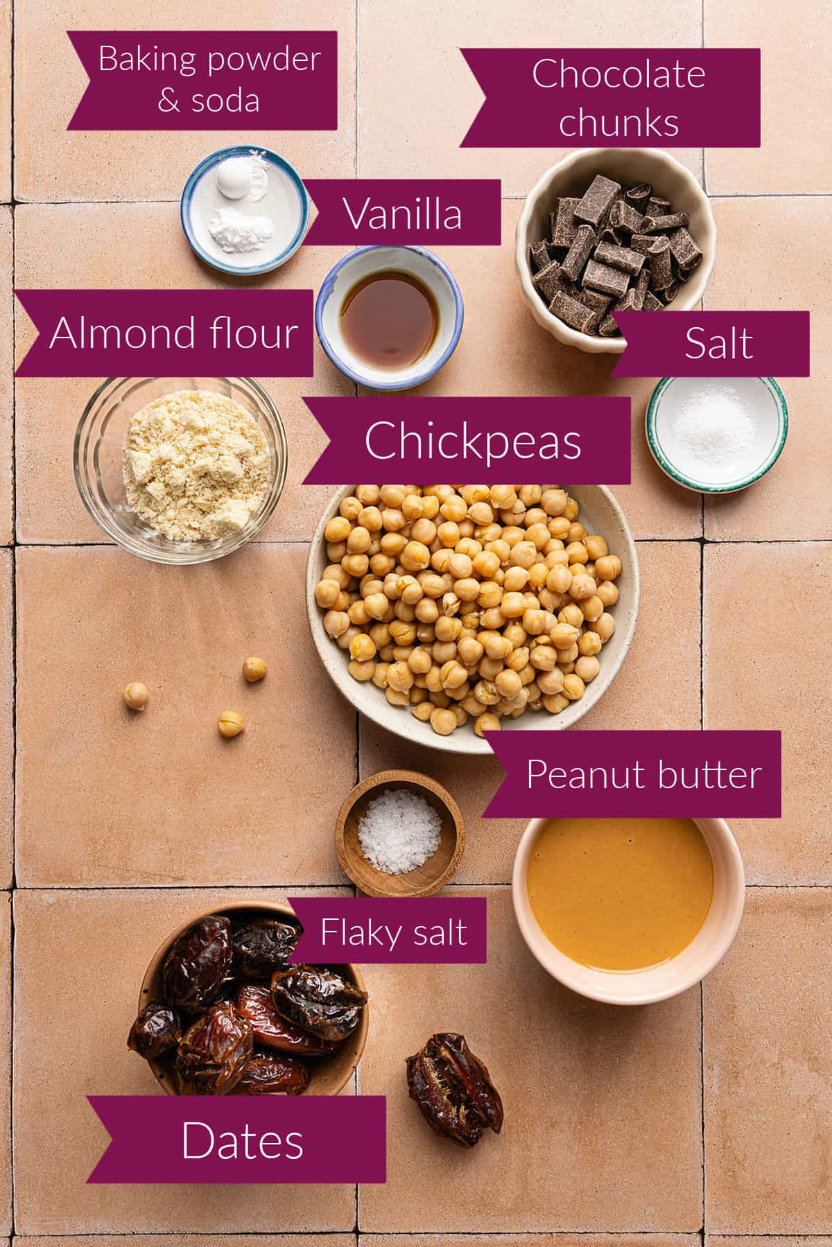 Baking soda and powder, vanilla, chocolate chunks, almond flour, chickpeas, salt, peanut butter, and dates.