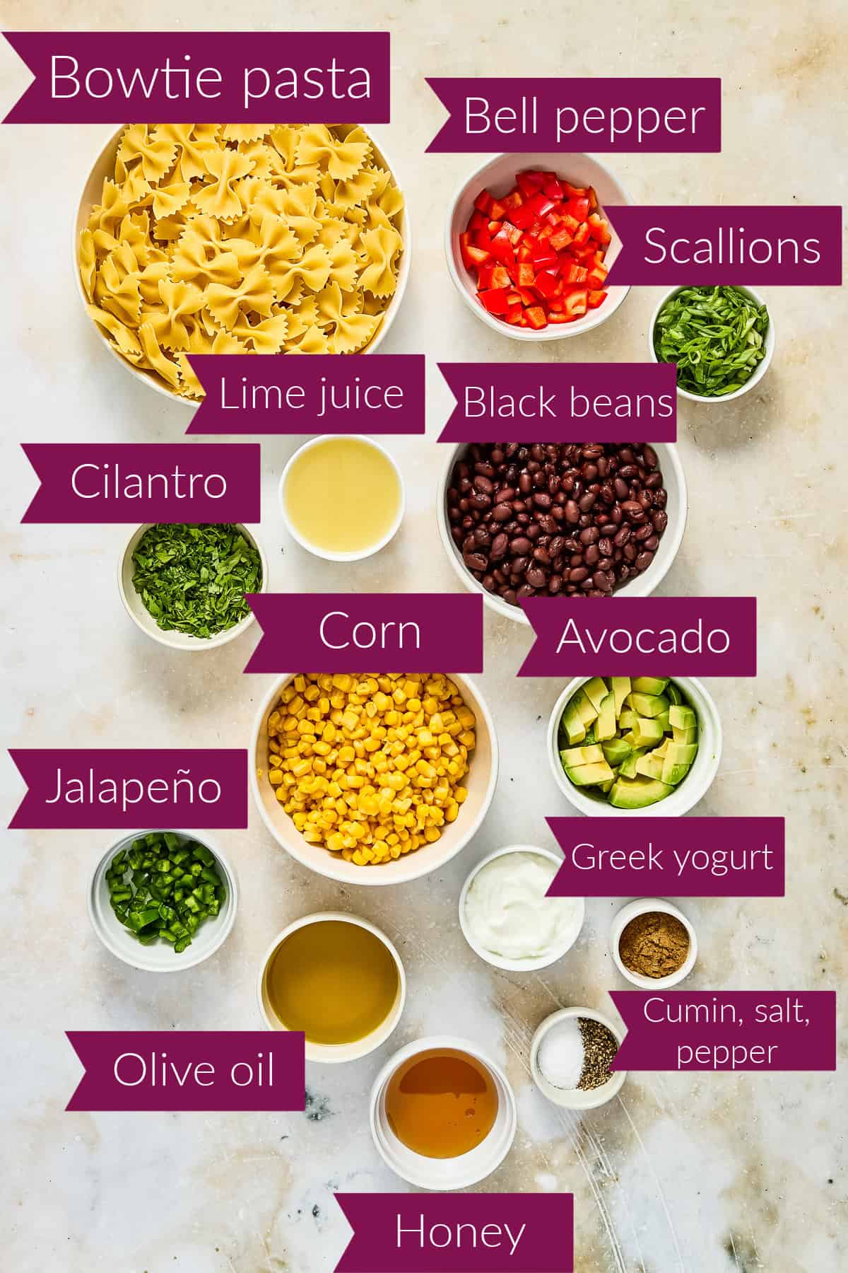 Pasta, peppers, scallions, cilantro, lime juice, black beans, jalapeño, corn, avocado, oil, yogurt, honey, and spices.